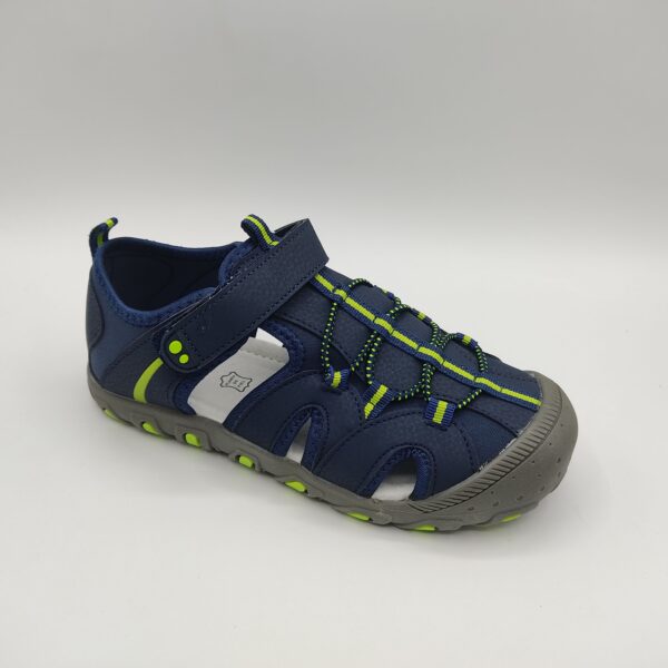 Sandalia deportiva para niño de la marca Bubble Kids, modelo 1327 en color marino. Suela de goma gris y verde. Fabricada con lycra marino y polipiel marino con detalles verdes. Cierre con velcro marino sobre el empeine. Plantilla de piel.
